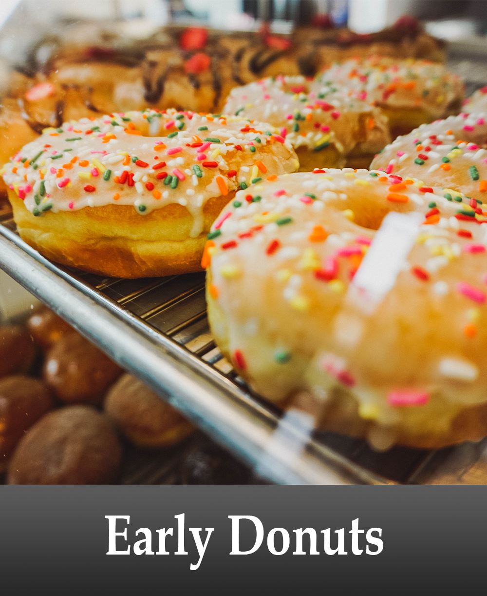 Image of Donut Shop Donuts on a Table with Business Information Below