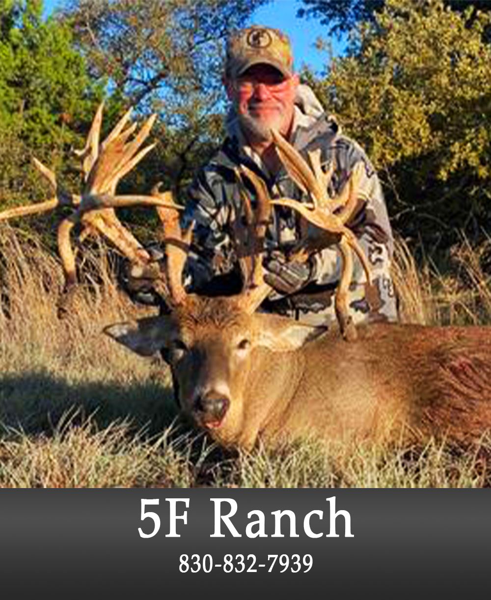 Image of a Man Holding a Deer up by its Antlers