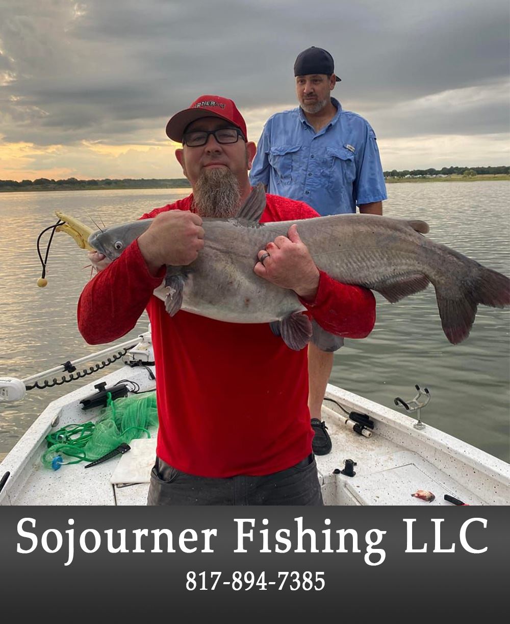 Image of man holding a big fish.