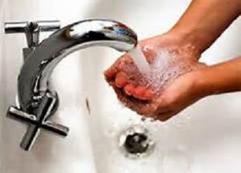 Image of a Person Washing Their Hands