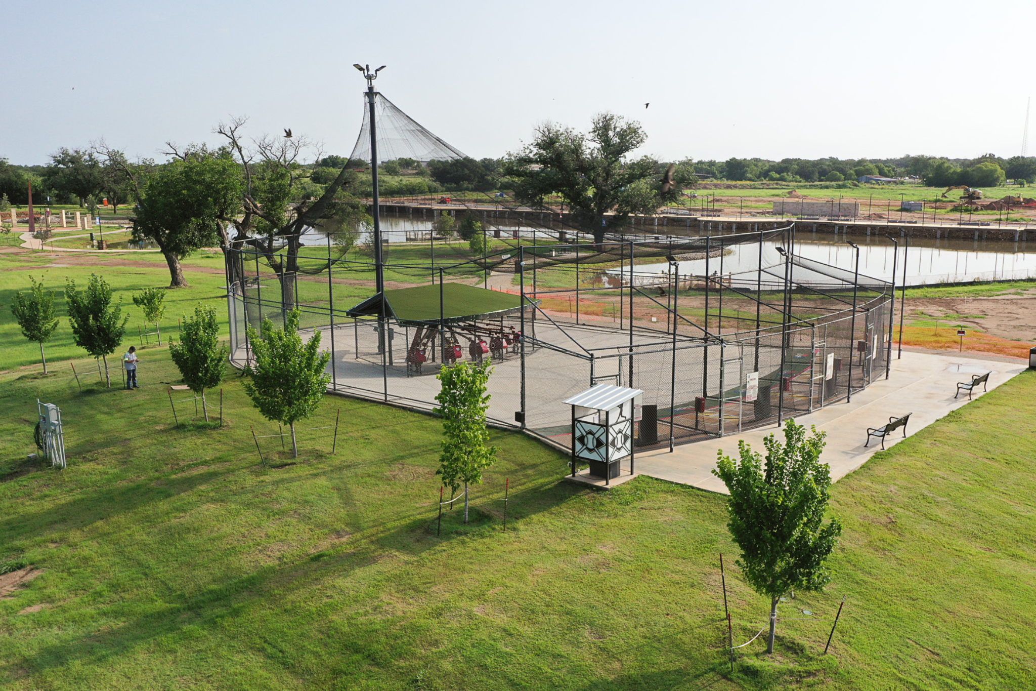 Picture of a batting cage in the park