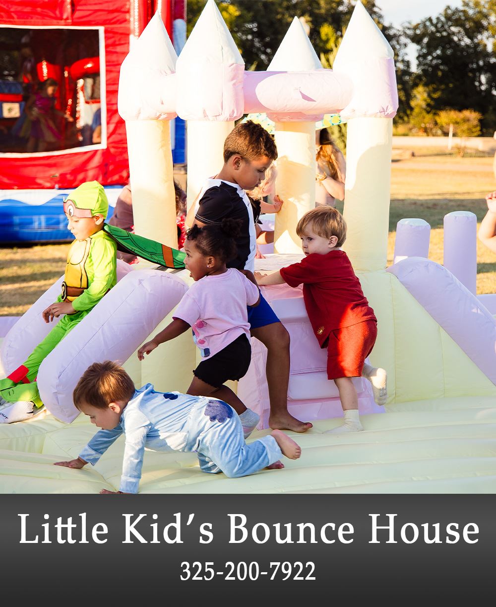 Picture of a small bounce house with kids on top of it