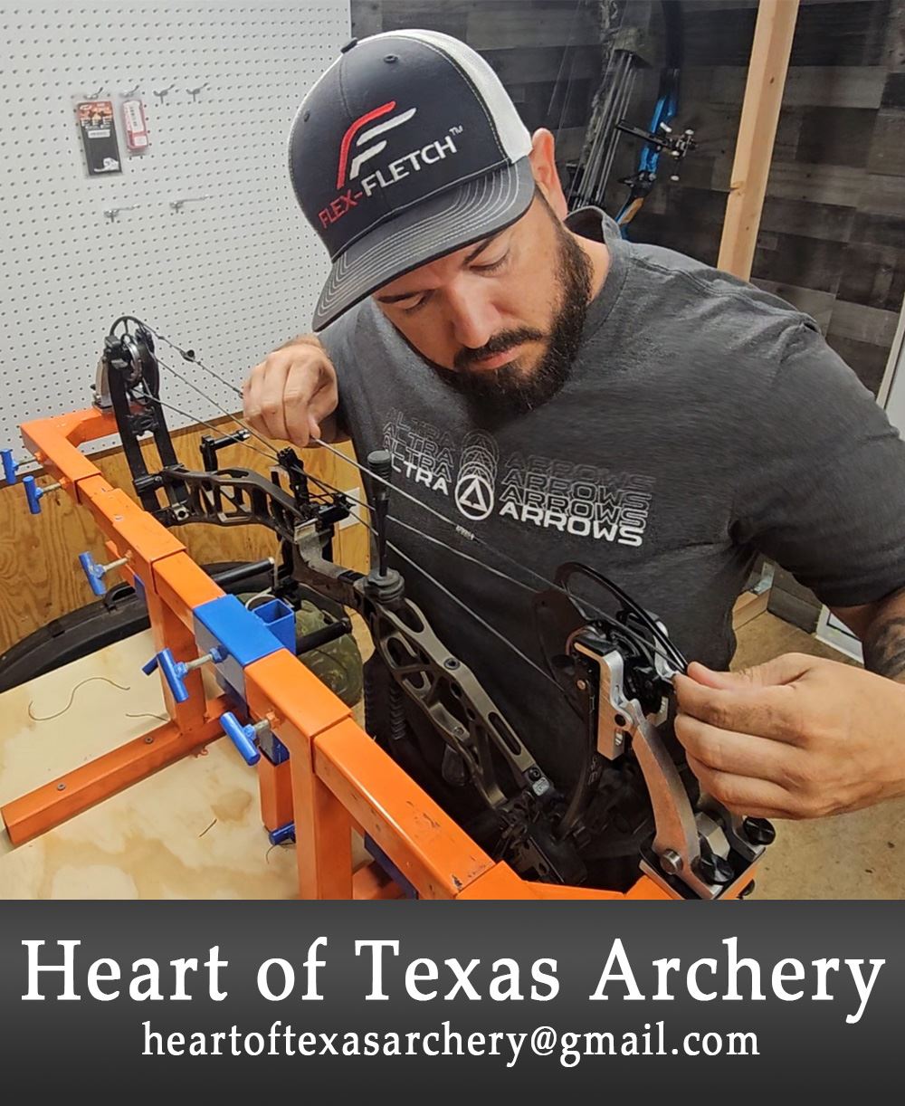 Picture of a man fixing a bow